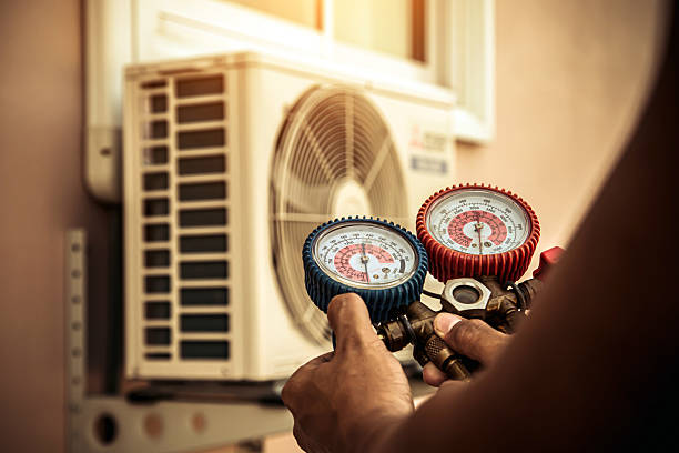 Professional Hvac technician working in Hartshorn, MO